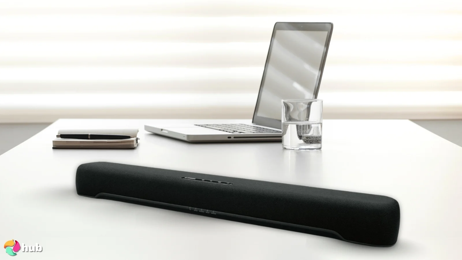 Yamaha Audio SR-C20A Soundbar on a white office desk in a clean setup for a review