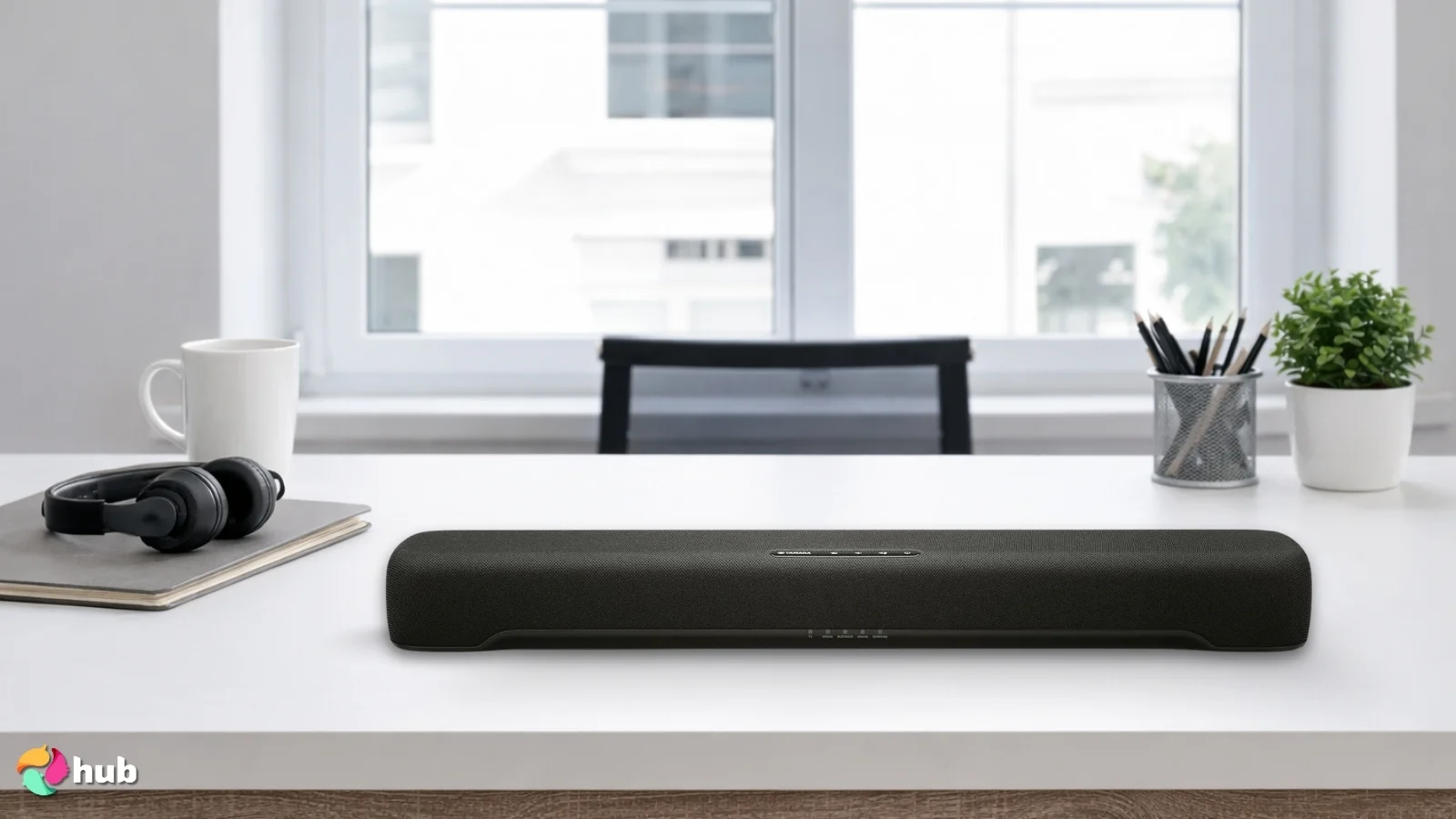 Yamaha SR-C20A Soundbar on a white office desk with decorative items for a review