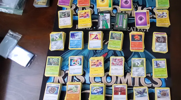 top view - pokemon cards are on the table
