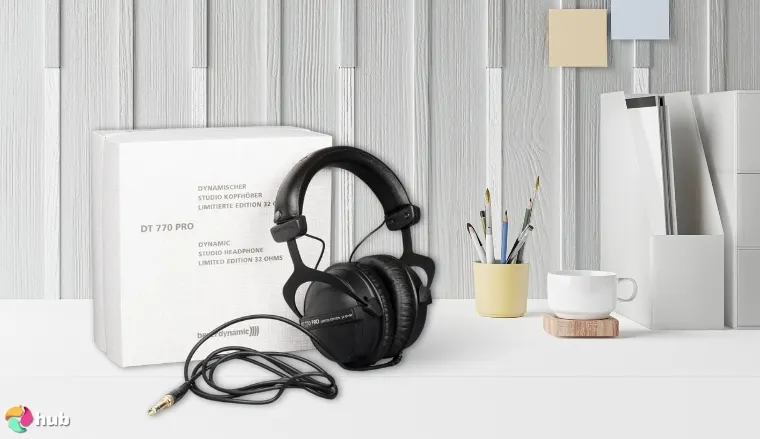 beyerdynamic DT 770 PRO Studio Headphones on a white office desk styled neatly for a review