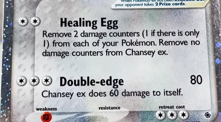 Close-up of a Pokémon card showing a star rarity symbol