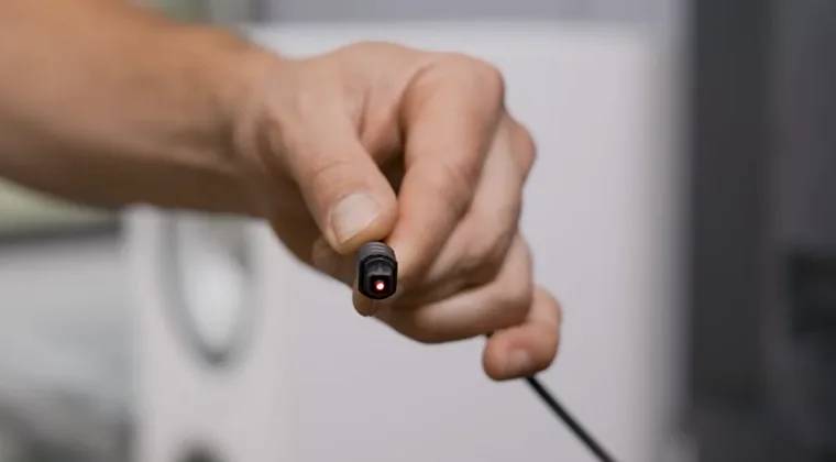 Cable held in a person’s hand