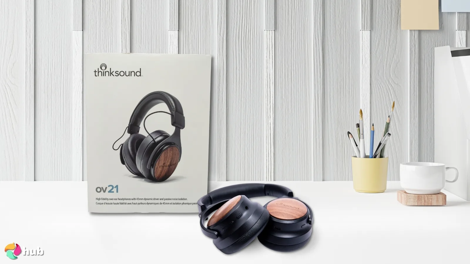 thinksound ov21 Headphones on a white office desk with minimal decor for a review