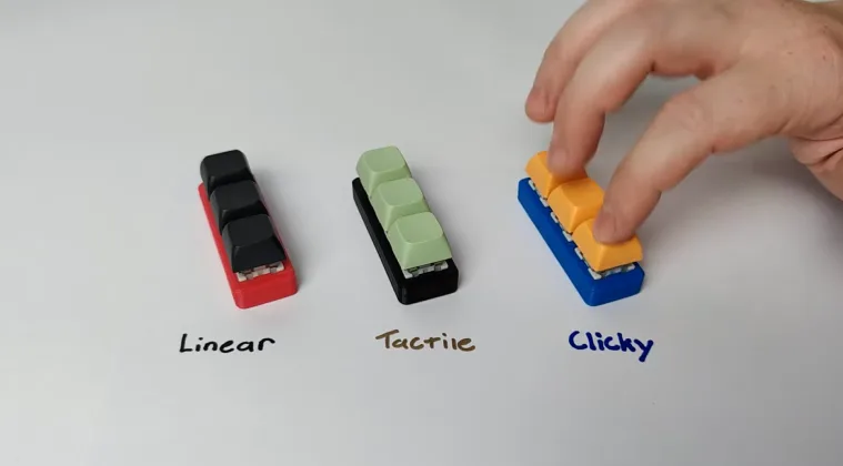 Three sets of mechanical keyboard switches on a table