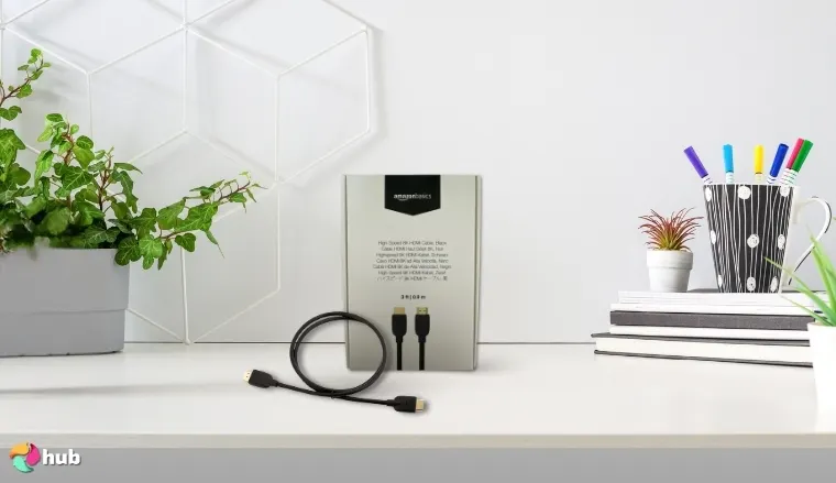 Amazon Basics 3 ft HDMI Cable on a white office desk with balanced composition for a review