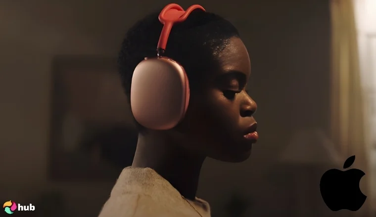 Close-up of a person wearing headphones from an Apple commercial