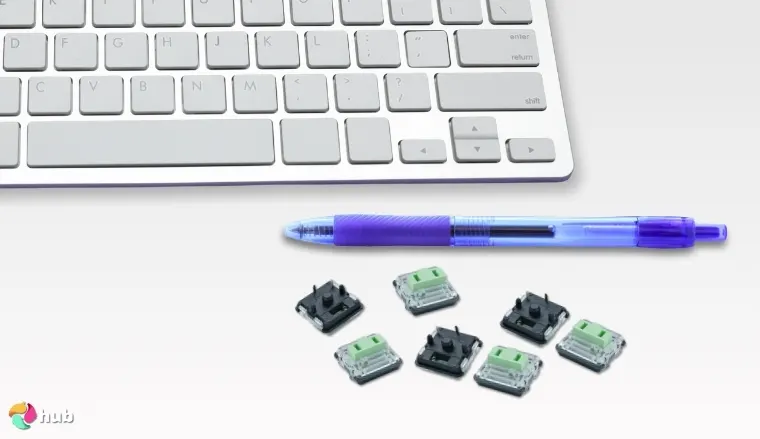 Chosfox Kailh Choc V1 Low-Profile Switches on a white office desk in a well-lit setting for a review
