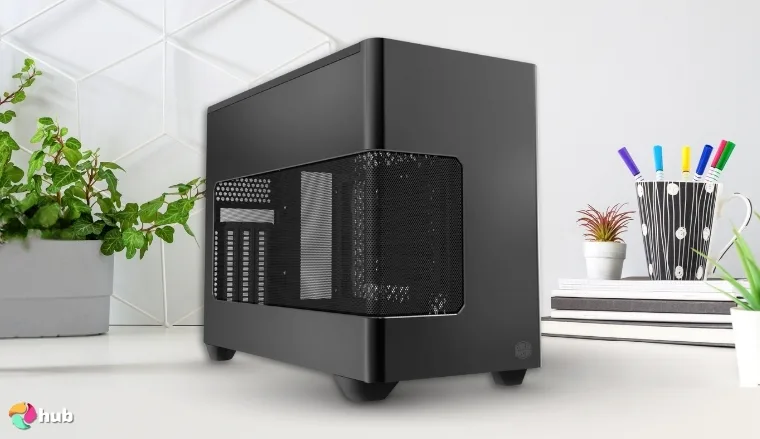 Cooler Master NR200P V3 Mini ITX Case on a white office desk in close-up for a review