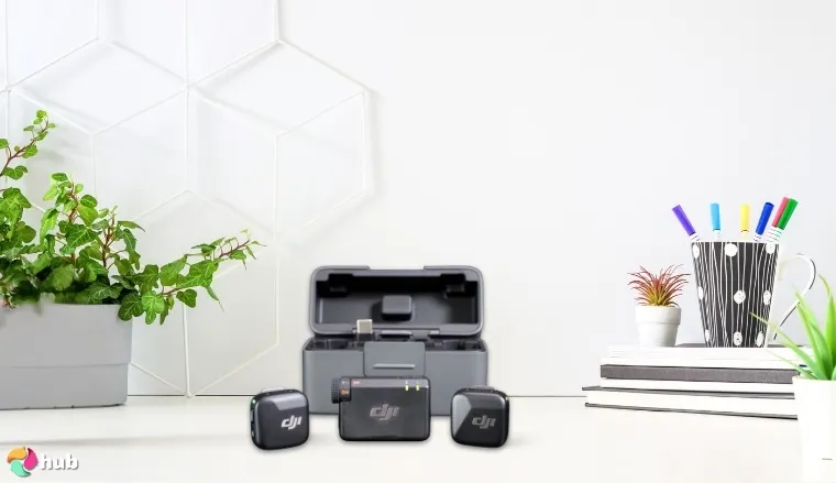 DJI Mic Mini Wireless Mini Microphone on a white office desk with balanced composition for a review