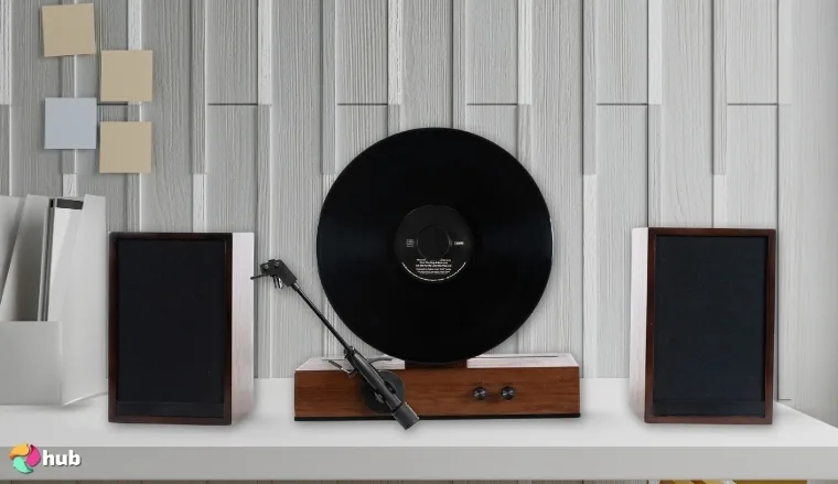 Fuse GLD Vertical Record Player on a white office desk prepared for testing shots