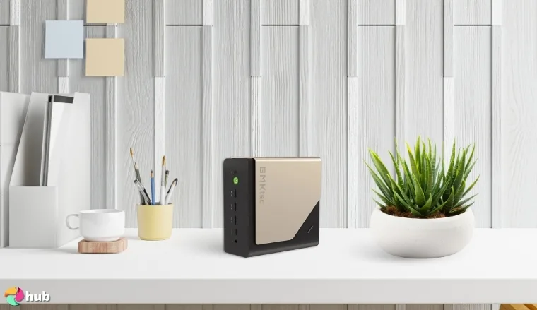 GMKtec EVO-T1 Mini PC on a white office desk with decorative items for a review