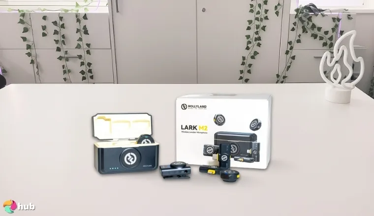 Hollyland Lark M2 Lavalier Microphone on a white office desk styled neatly for a review