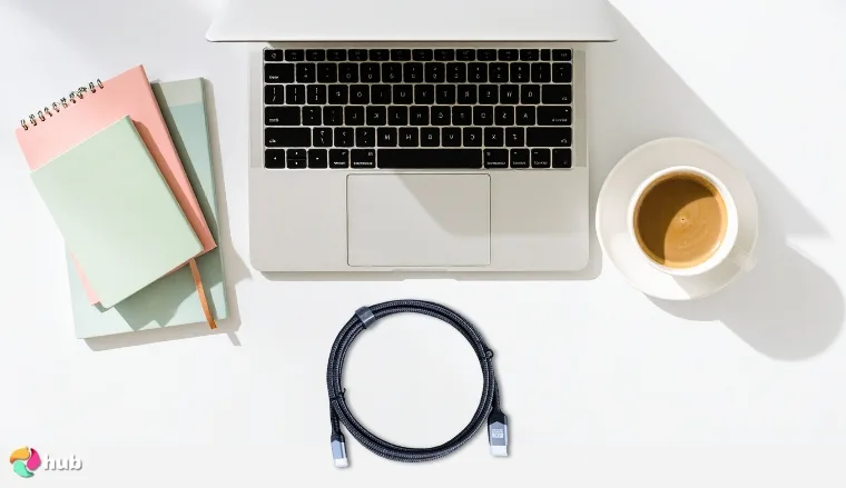 JSAUX Mini HDMI on a white office desk in a top-down view for a review