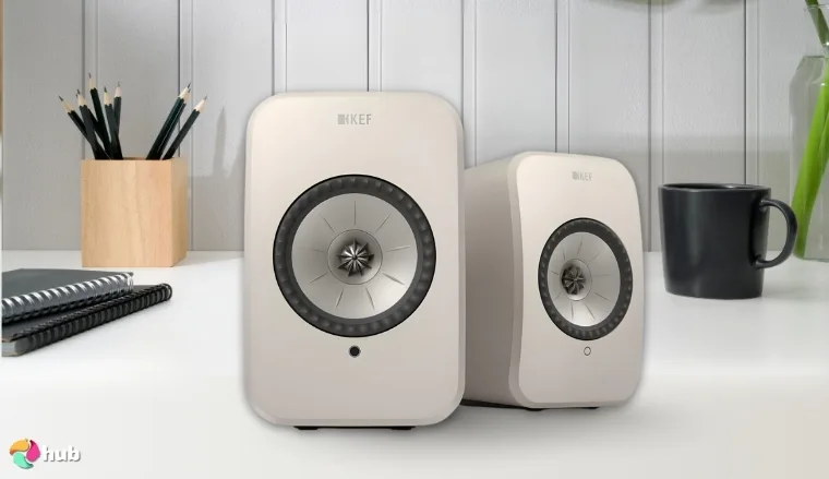 KEF LSX II Speakers on a white office desk in close-up for a review