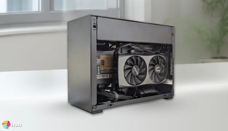 Lian Li A4-H2O Mini ITX Case on a white office desk in a well-lit setting for a review