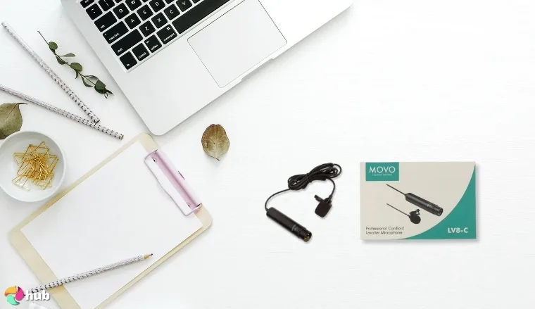 Movo LV8-C Lavalier Microphone on a white office desk with an editorial style for a review