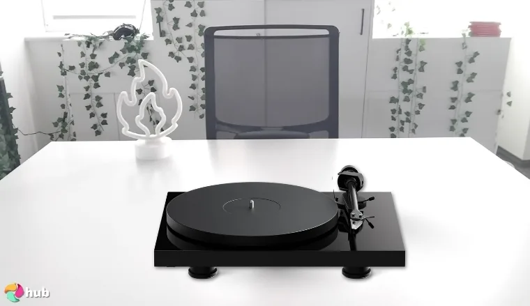 Pro-Ject Debut EVO 2 Audiophile Turntable on a white office desk in a minimalist setup for a review
