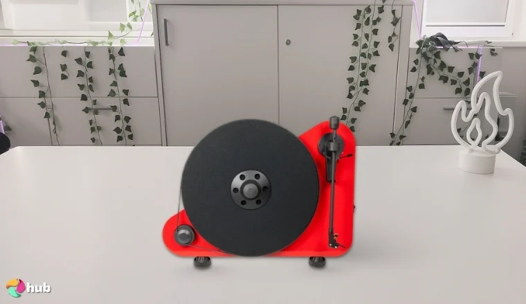 Pro-Ject VT-E BT R Vertical Record Player on a white office desk with simple styling for a review