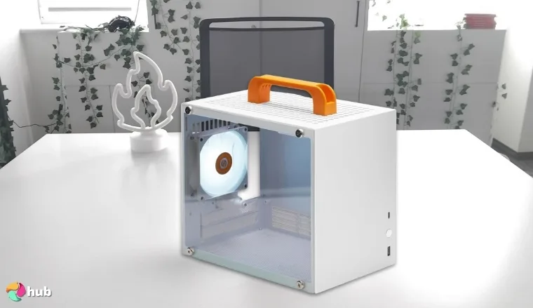 SGPC K66 Lite Mini ITX Case on a white office desk in a bright workspace for a review