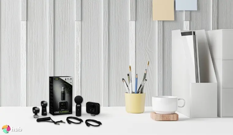 Shure MoveMic 88+ Wireless Microphone on a white office desk styled for promotional review