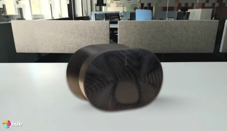 Sonos Era 300 Speaker on a white office desk with soft lighting for a review