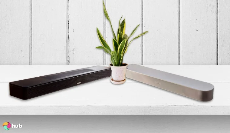 Sonos and Bose Soundbar on the white desk with a plant between them