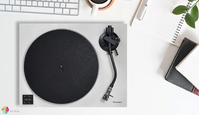 Technics SL-40CBT Audiophile Turntable on a white office desk with creative arrangement for a review