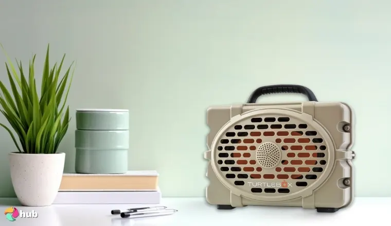 Turtlebox Original Gen 3 Speaker on a white office desk with creative arrangement for a review