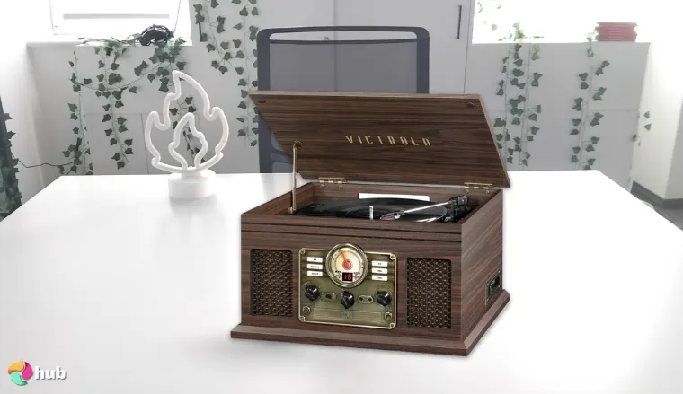 Victrola The Quincy 6-in-1 Record Player on a white office desk prepared for product photography