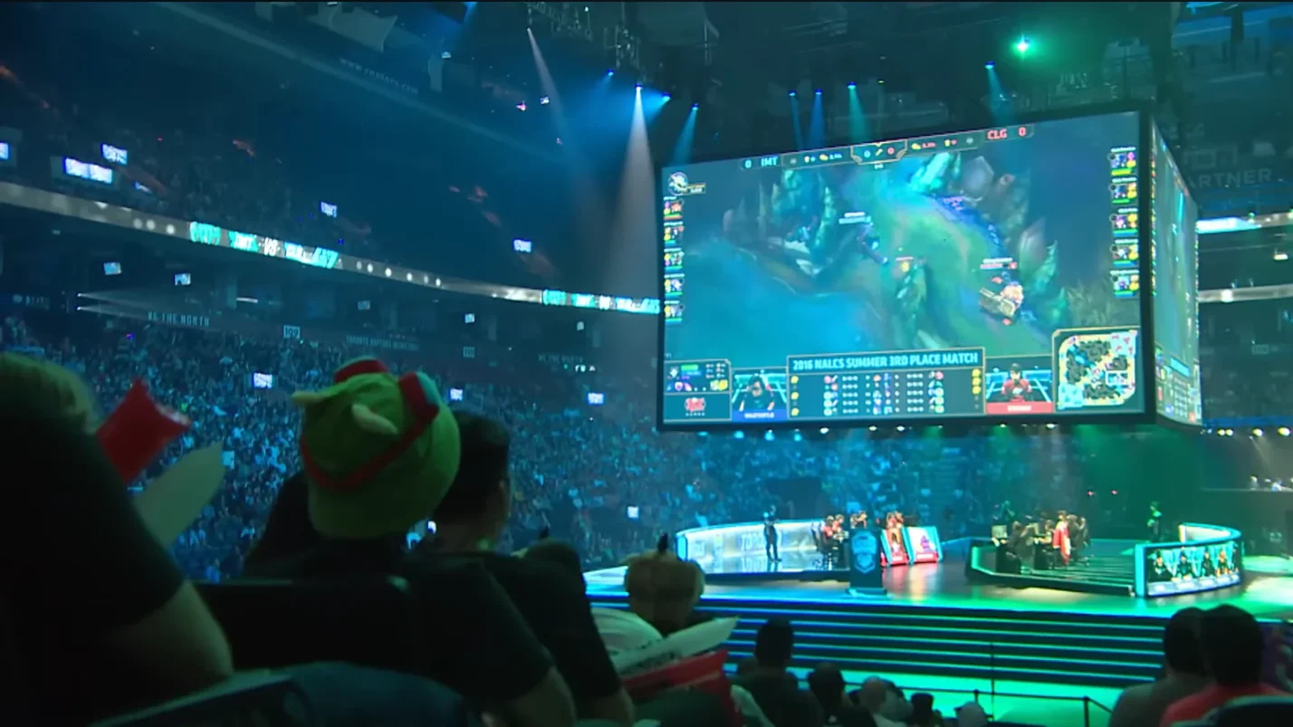 esports tournament arena with players at stations