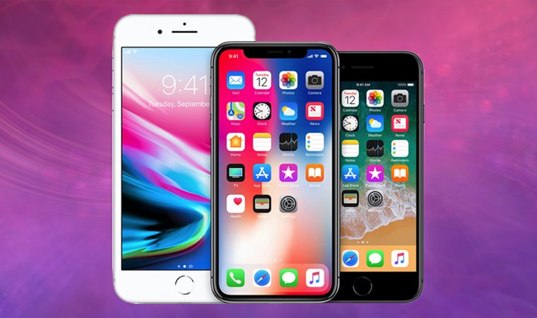 Three smartphones near each other on a purple and pink background.
