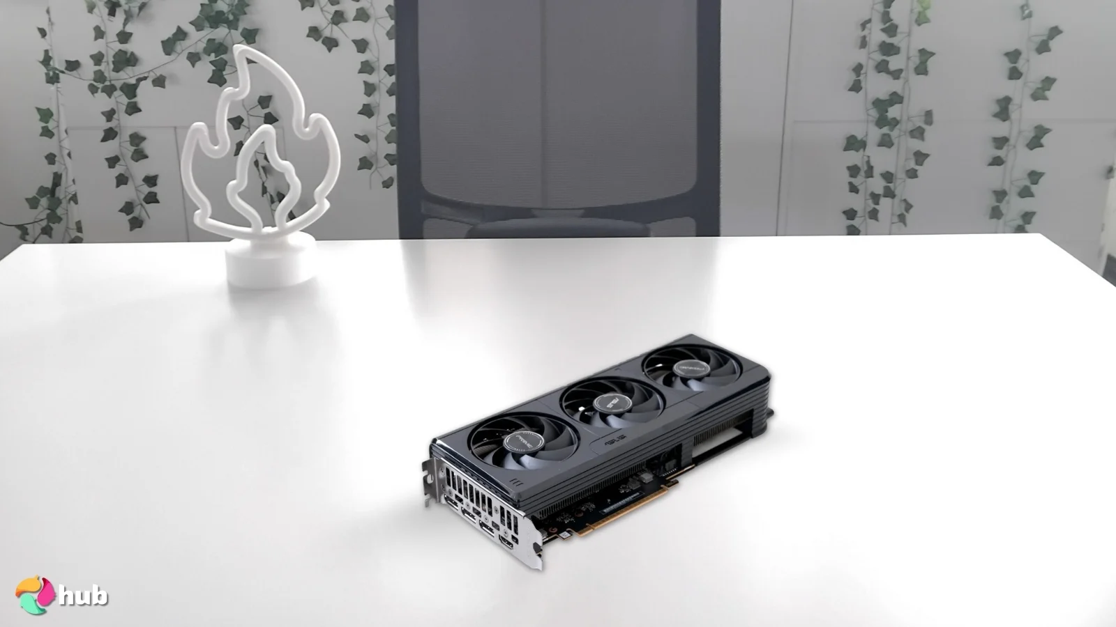 ASUS GeForce RTX 5060 Low Profile GPU on a white office desk with minimal decor for a review