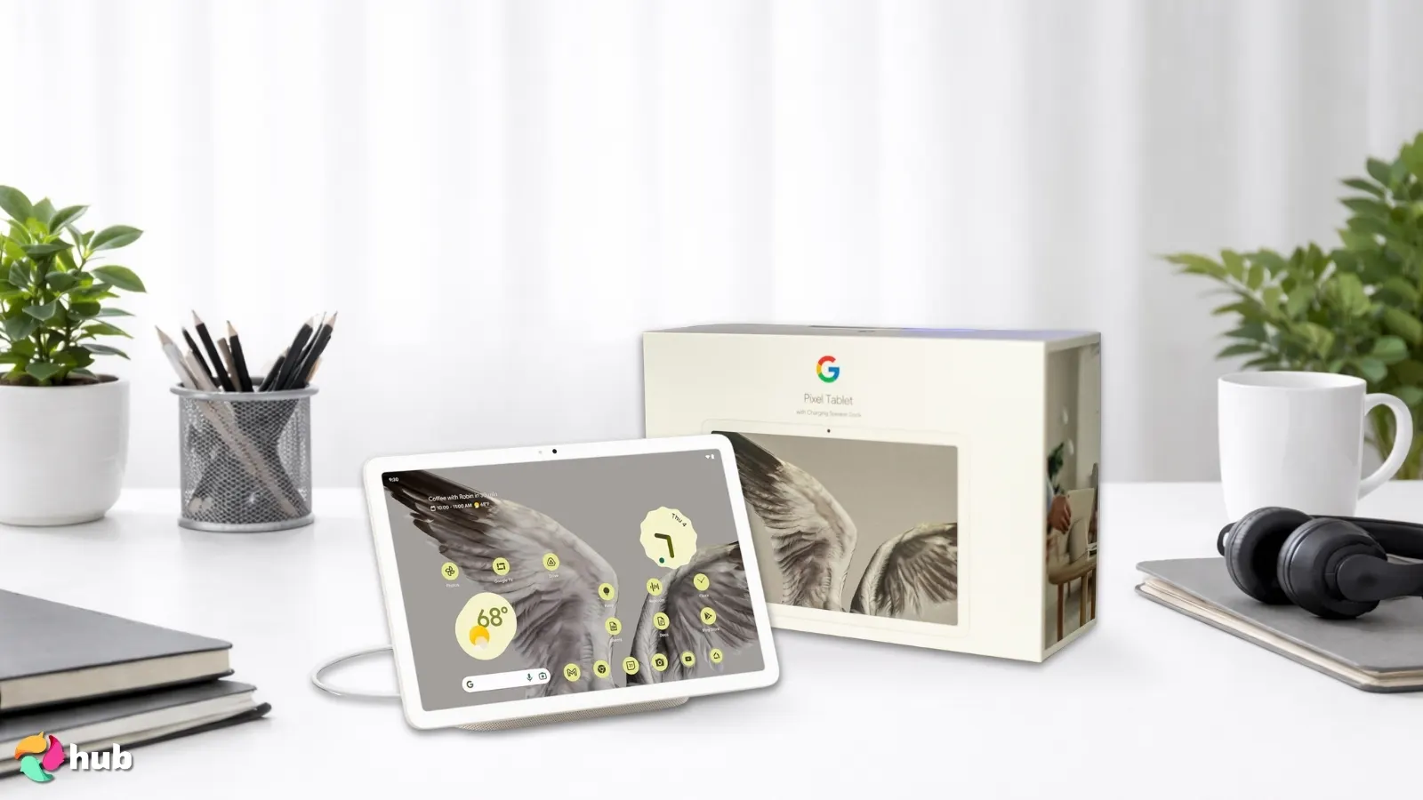 Google Pixel Tablet on a white office desk styled neatly for a review
