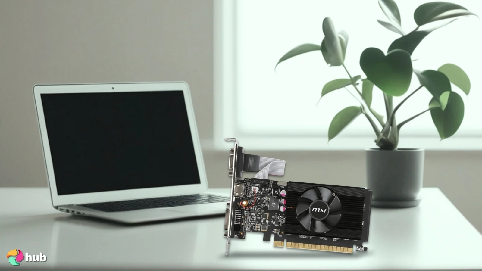 MSI GeForce GT 710 2GD3 Low-Profile GPU on a white office desk styled neatly for a review