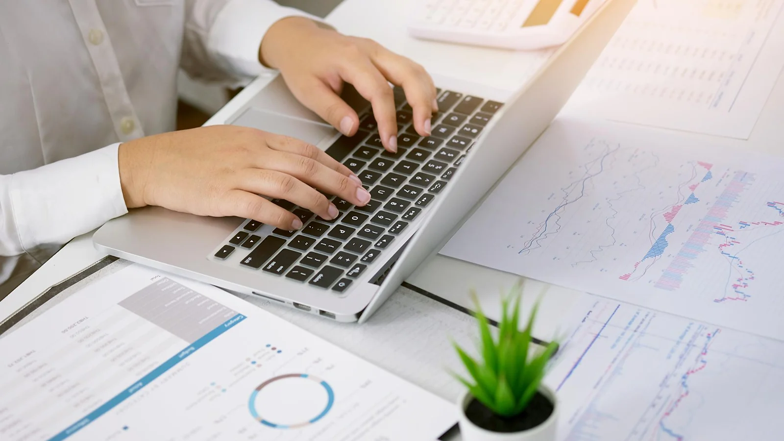 a woman working on a laptop