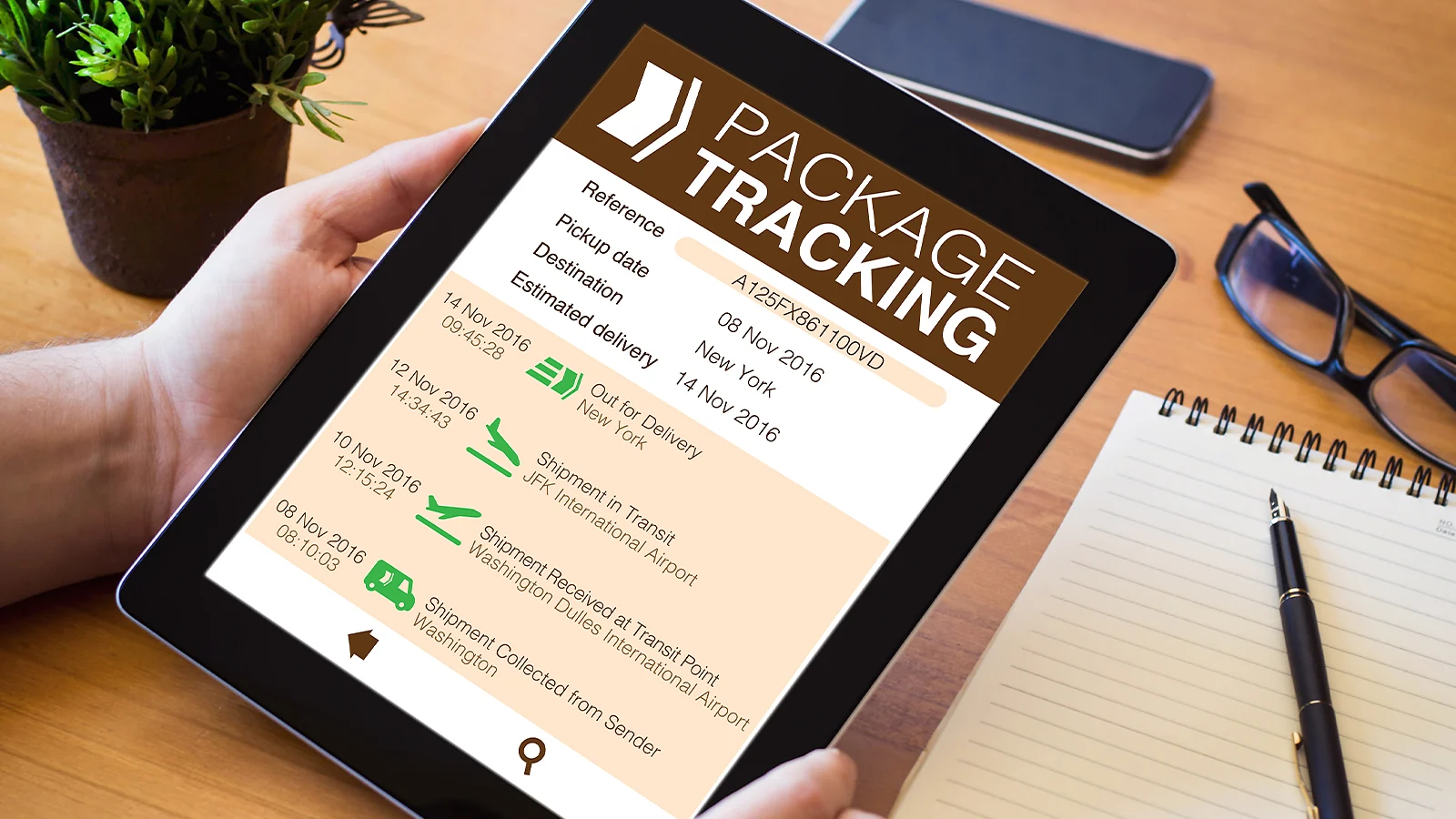 Tablet displaying a package tracking interface with shipment status updates and delivery dates