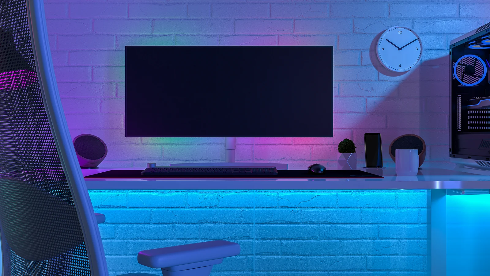 Minimalist gaming setup with a wide monitor, RGB lighting, and a white brick wall