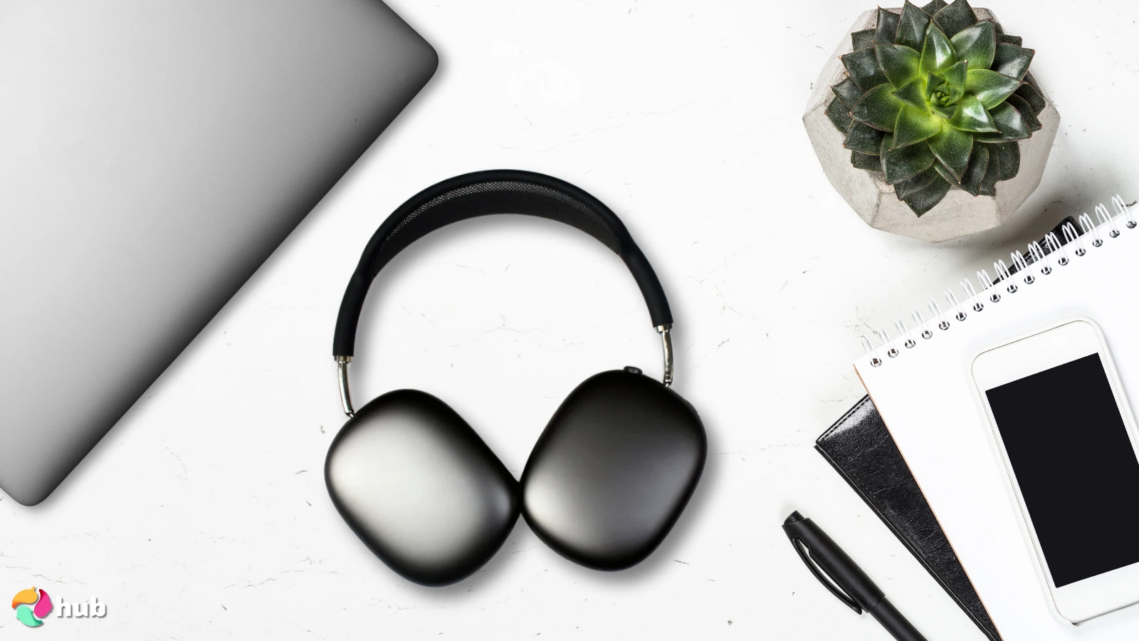 Apple AirPods Max 2 Headphones on a white office desk in close-up for a review