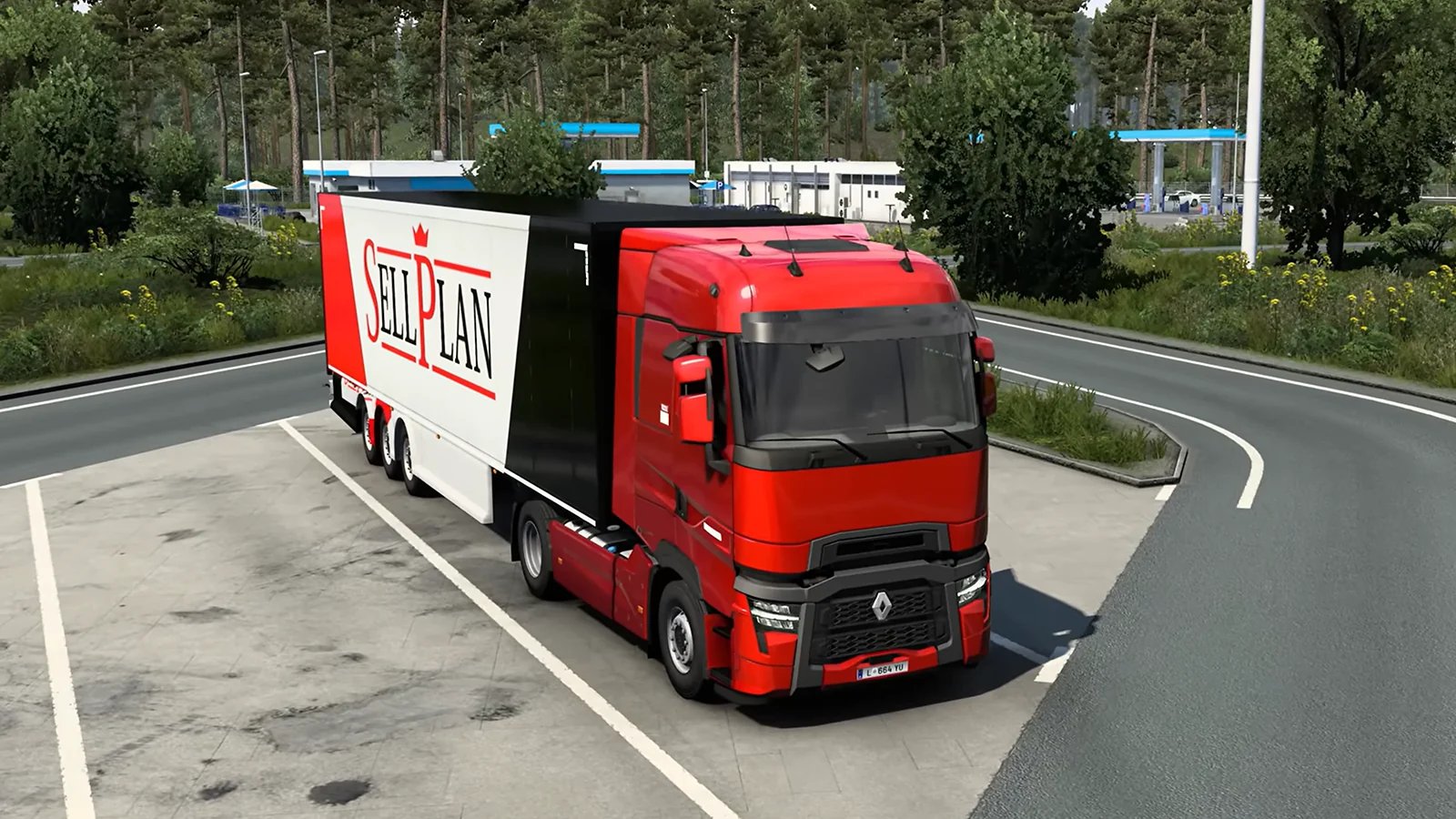 Un camión rojo circulando por el mundo abierto de Euro Truck Simulator 2