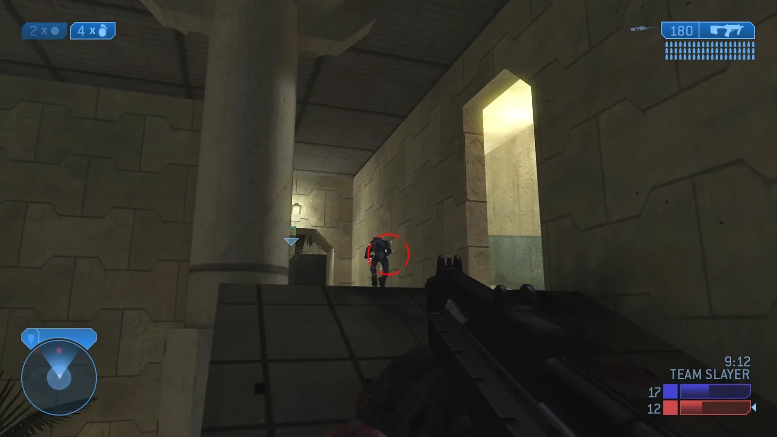Aiming an SMG at an enemy Spartan in a Halo 2 Team Slayer multiplayer match