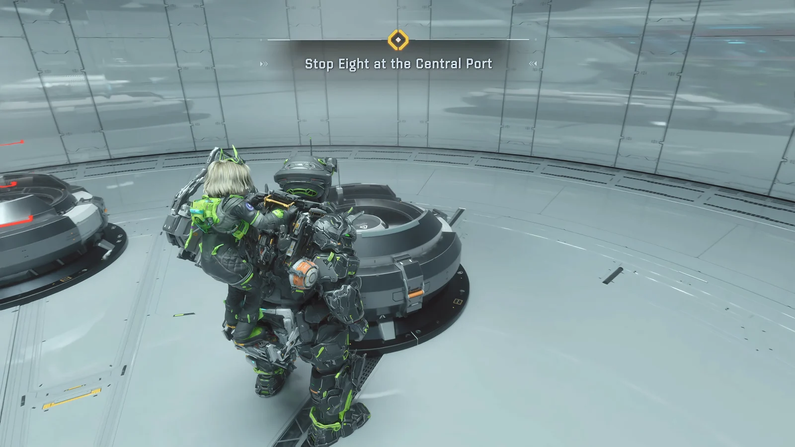 Pragmata - Hugh and Diana in black and neon green suits standing at a terminal.