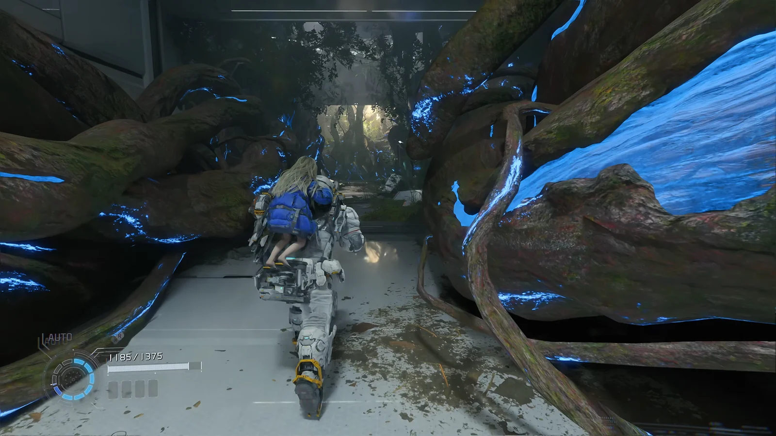 Pragmata - Hugh carrying Diana through a corridor overgrown with glowing blue roots.