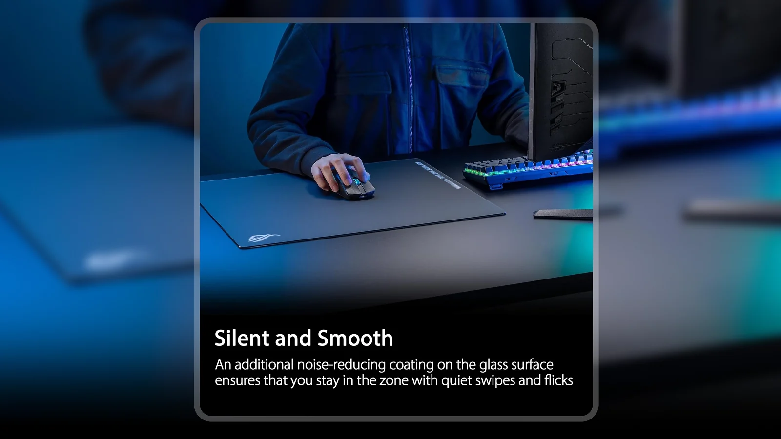 Gamer using ASUS ROG Moonstone Ace L glass mouse pad at RGB-lit gaming setup with keyboard and monitor visible