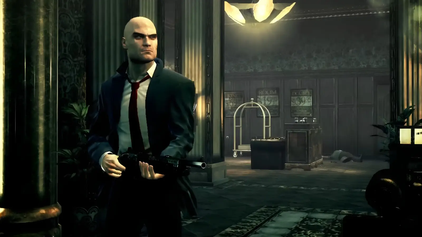 Agent 47 holding a shotgun in a hotel lobby in Hitman: Absolution