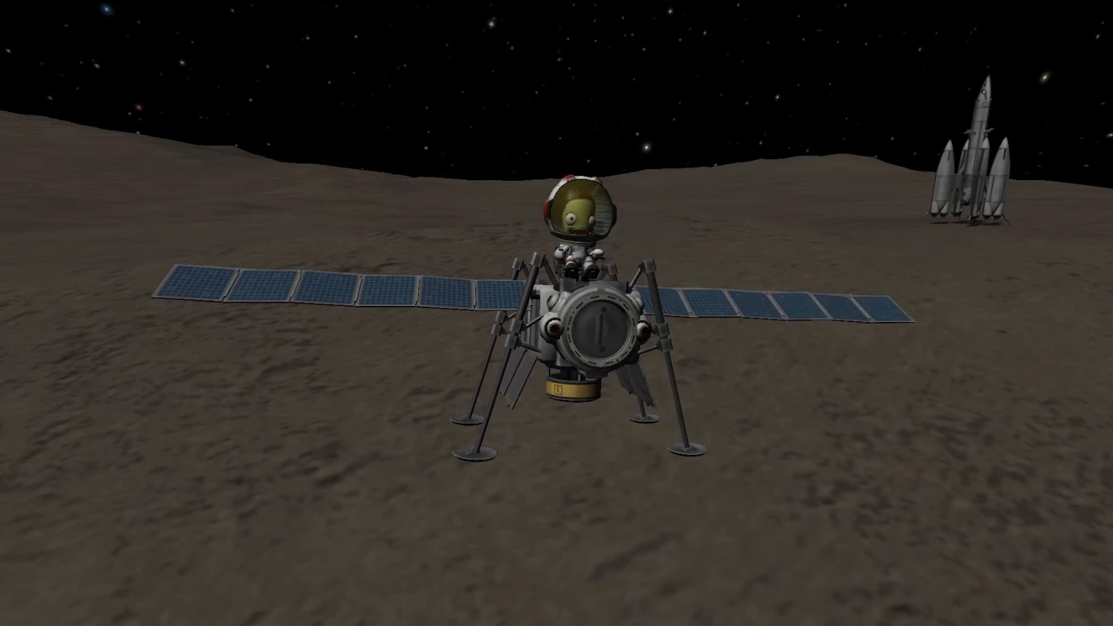 Un astronauta de Kerbal junto a un módulo de aterrizaje tras un aterrizaje lunar exitoso en Kerbal Space Program