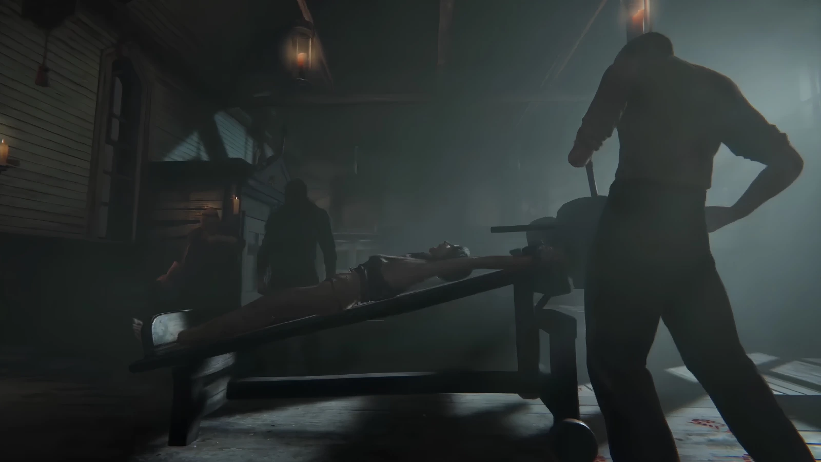 Dark torture chamber scene from Outlast 2's Temple Gate compound
