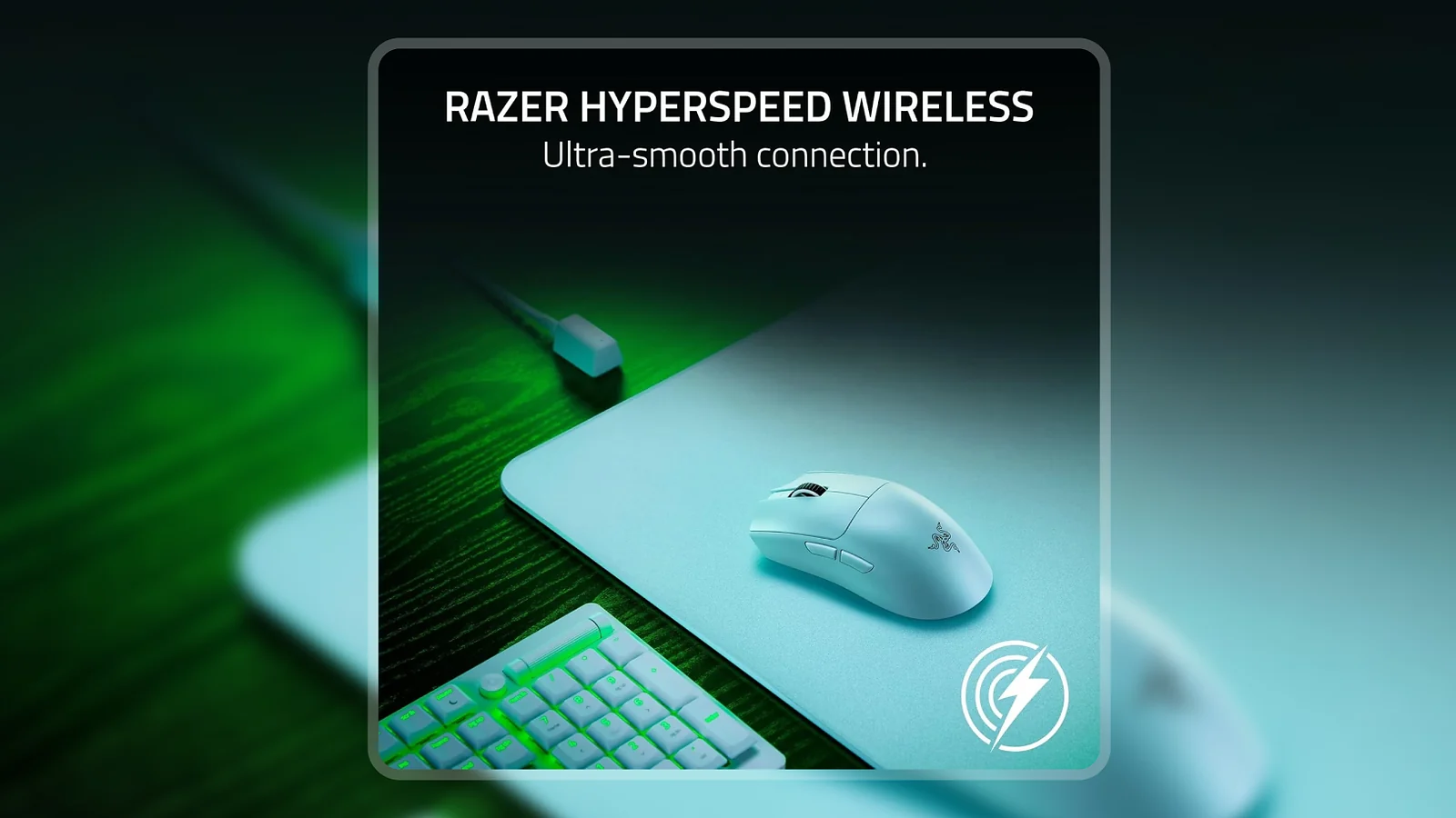 Razer Viper V3 Pro Wireless Gaming Mouse on a teal mouse pad with a keyboard and green ambient lighting