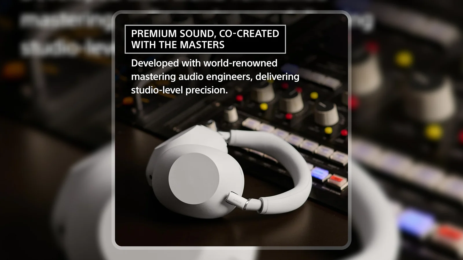 Sony WH-1000XM6 Platinum Silver headphones resting on a professional audio mixing console in a studio