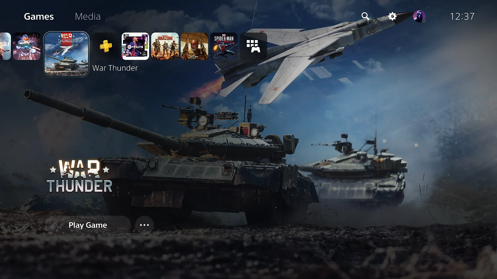 PlayStation 5 home screen displaying the War Thunder game tile and background art