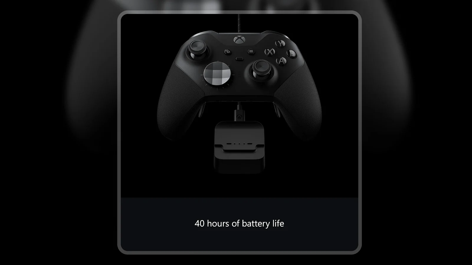 Xbox Elite Series 2 controller resting on USB-C charging dock against dark background